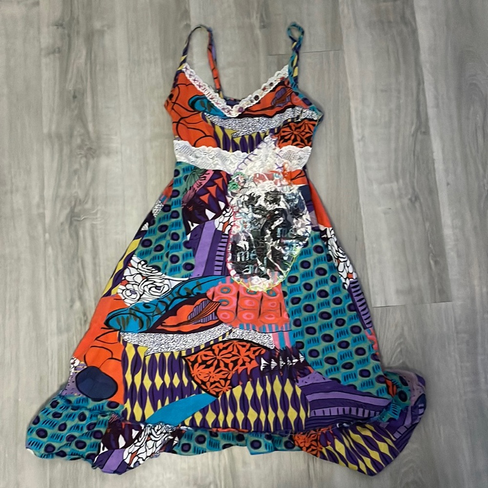 unique dress with multiple textures, colors, and patterns